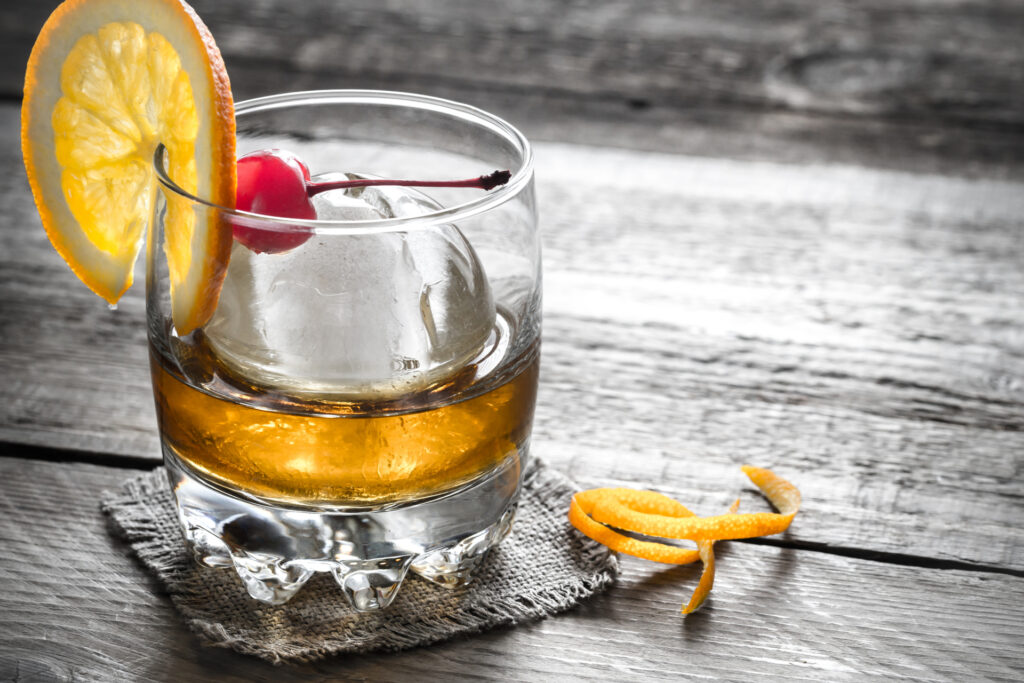 Old Fashioned Cocktails with a sphere ice cube